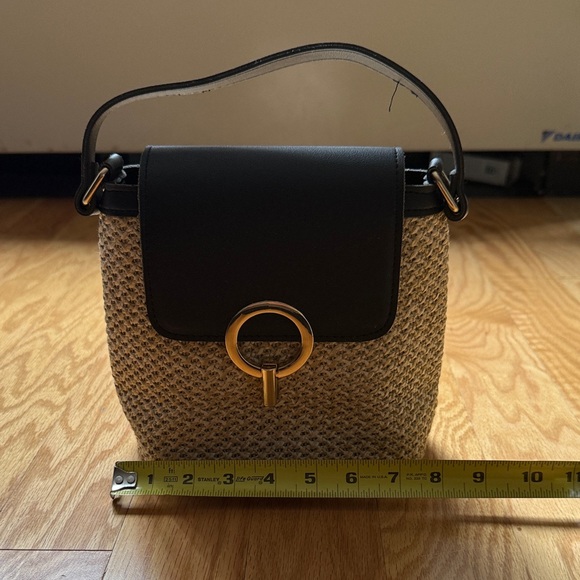 Handbags - Woven Straw Bucket Bag with Black Leather Flap and Gold Ring